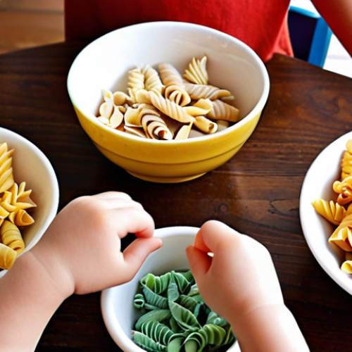 Home 15 A toddler sorting colorful pasta shapes (shells, rotini, penne) into different small bowls on a wooden table. Close-up shot, focusing on the child's hands and the textures of the pasta. Soft, natural lighting.
